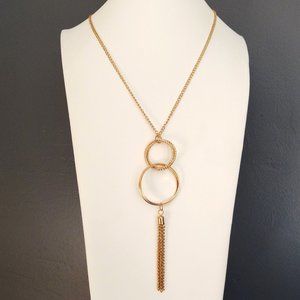 Long gold circle and tassel necklace